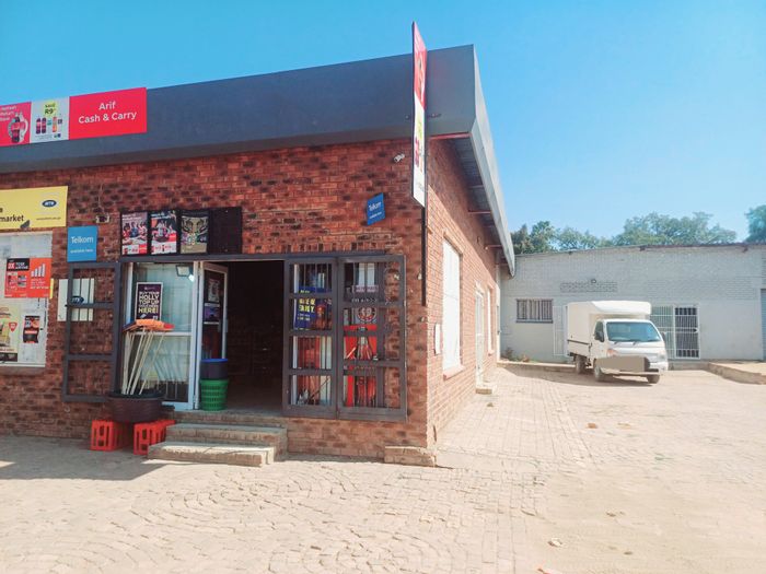 Retail property for sale in Modimolle Central with three business units and carport.