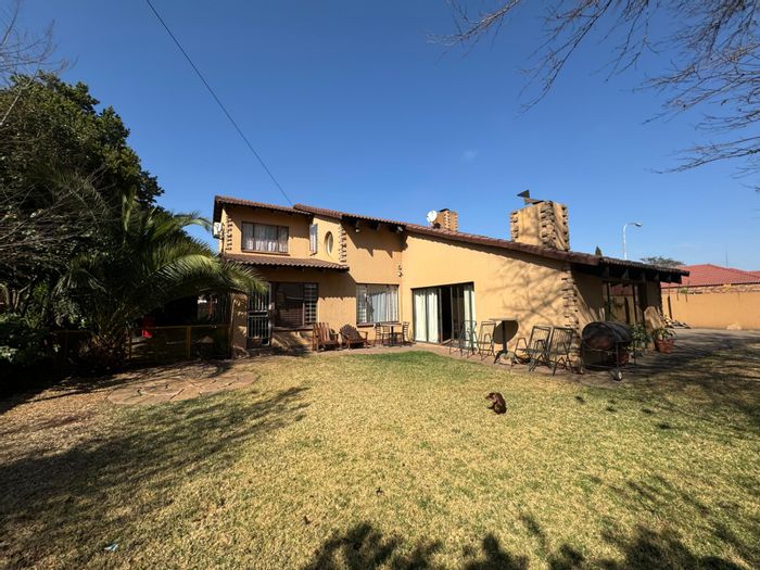 House To Rent in Wierda Park: 5 bedrooms, braai room, double garage, security features.