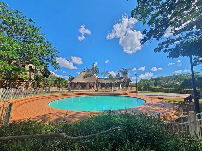 To Rent: Apartment in Mooikloof Ridge with 24-hour security, pools, and sports facilities.