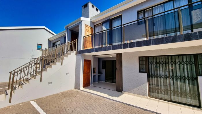 2-bedroom apartment for sale in Hartenbos Central with undercover braai area and parking.