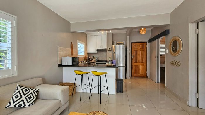 Spacious Sea Point apartment with garden, close to beach and amenities, For Sale.