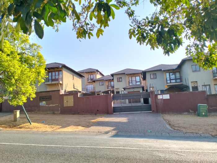 For Sale: 3-Bedroom Townhouse in Sonheuwel with garden, balcony, and security features.