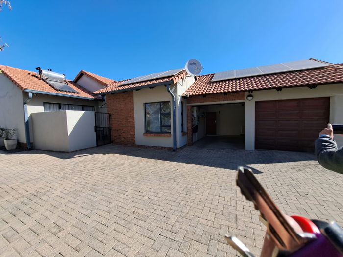 For Sale: Townhouse in Secunda Central with double garage, inverter, and JoJo tank.