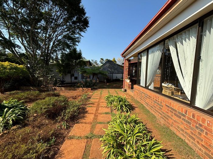 For Sale: House in Sabie Ext 9 with 4 beds, guest entrance, and lush garden.