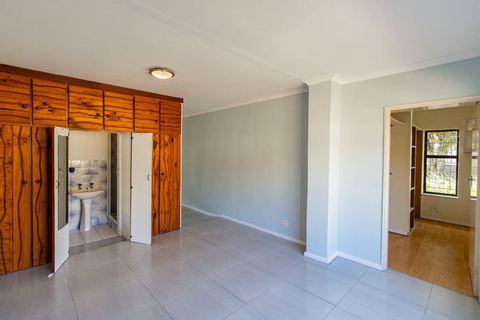 Dobson House For Sale: Open plan living, indoor braai, pool, double garage.