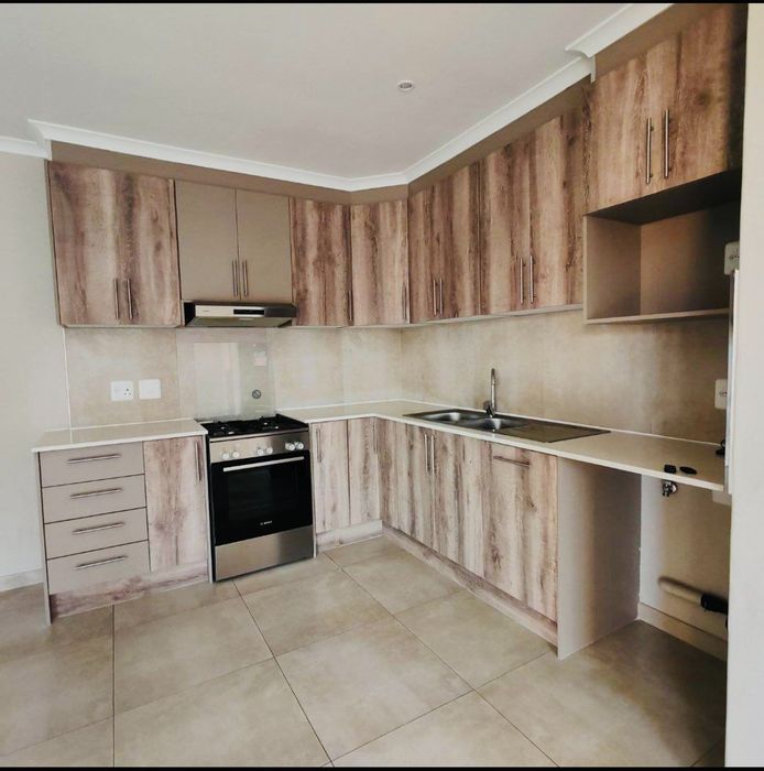 For Sale: Townhouse in Secunda Central with 3 bedrooms, double garage, and alarm system.