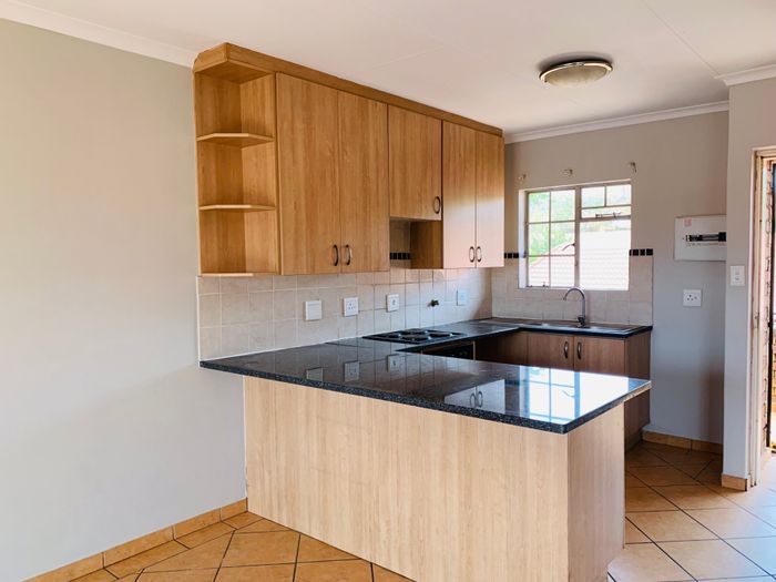 For Sale: Two-bedroom apartment in Tileba with pool, braai area, and security.