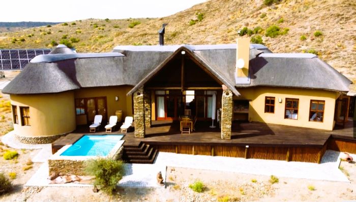 Oudtshoorn Rural Small Holding For Sale: Game Farm access, pool, en-suite bedrooms.