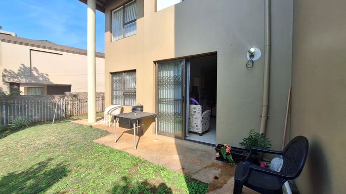 Ballito Central Apartment For Sale: Ground-floor unit, garden, pool, 24-hour security.