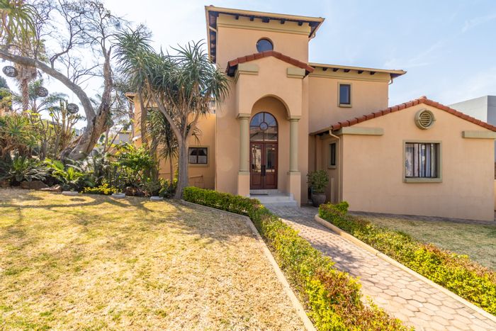 For Sale: House in Featherbrooke Estate with guest cottages, jacuzzi, and security.