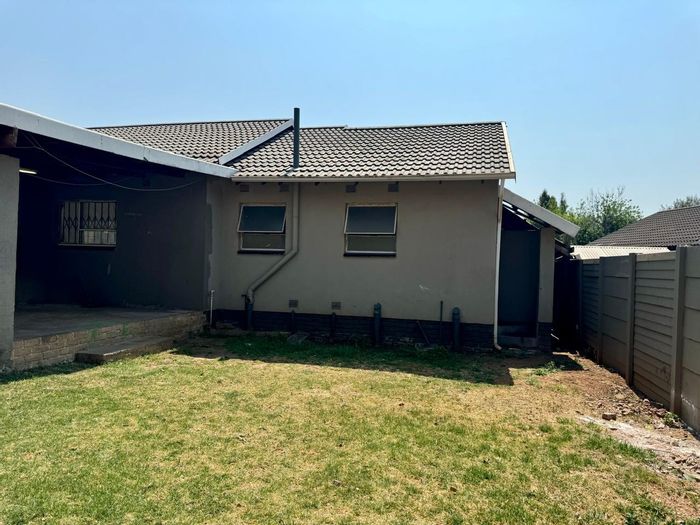 For Sale: House in Mayberry Park with 3 bedrooms, garden, and built-in braai.