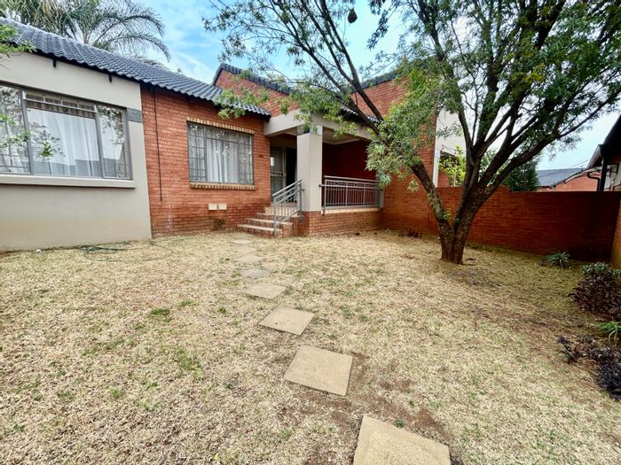 For Sale: Mooikloof Ridge Townhouse with 2 beds, private garden, double garage.