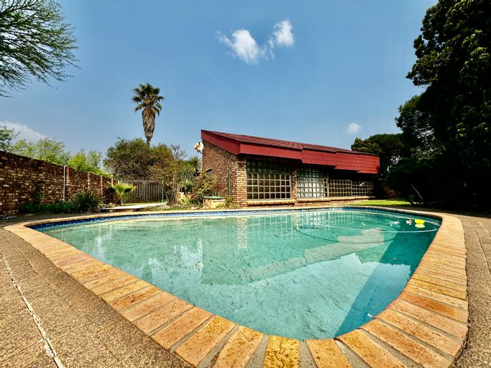 4-Bedroom House For Sale in Secunda Central with pool, patio, and borehole.