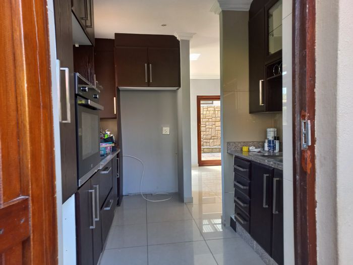 For Sale: Townhouse in Randpark Ridge with garden, garage, and maid quarters.