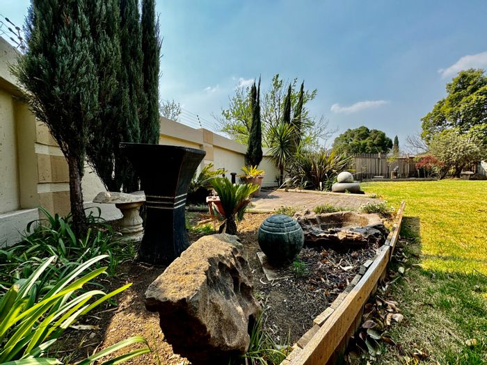 For Sale: Secunda Central House with spacious garden, security features, and ample parking.