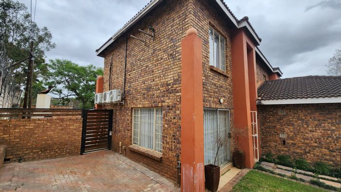 For Sale: Townhouse in West Acres with private garden, near schools and golf courses.