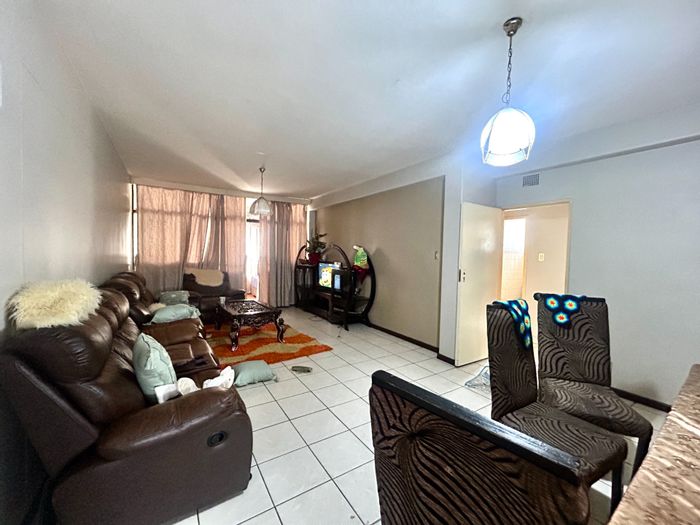 Sunnyside Apartment For Sale: 2 bedrooms, spacious living area, near transport and shops.