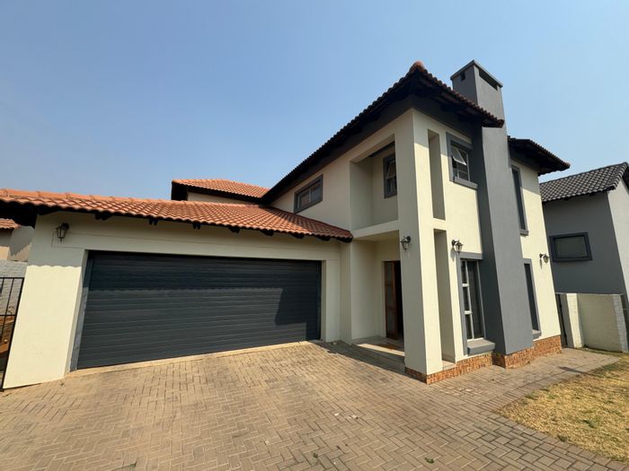 For Sale: House in Olympus AH with 4 bedrooms, double garage, open-plan living.