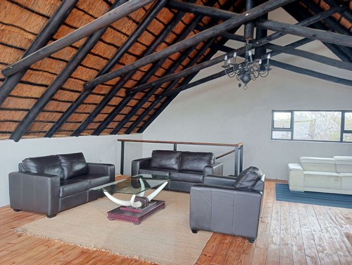 Spacious 7-bedroom house with pools, guest flat, and office in Marloth Park Central.