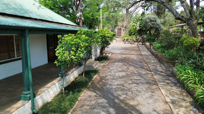 Historic house for sale in Sabie Central with garden flat and swimming pool.