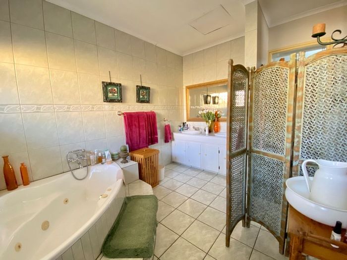 Spacious Kinross house for sale with pool, bar, and solar energy.