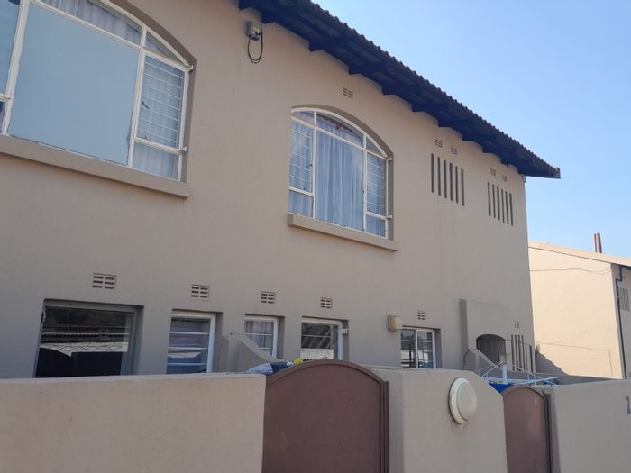 For Sale: Apartment in Corlett Gardens with pool, garages, and secure access.