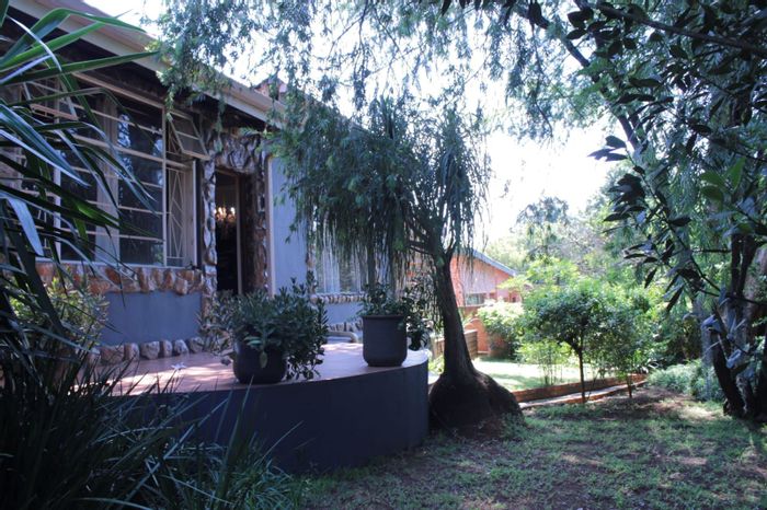 For Sale: House in Sabie Central with pool, braai area, and versatile rooms.