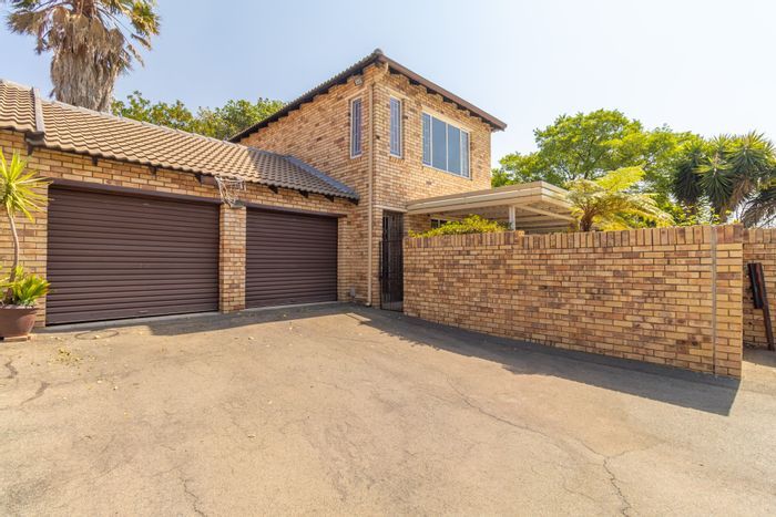 For Sale: Allen's Nek townhouse with pool, pet-friendly garden, and double garage.