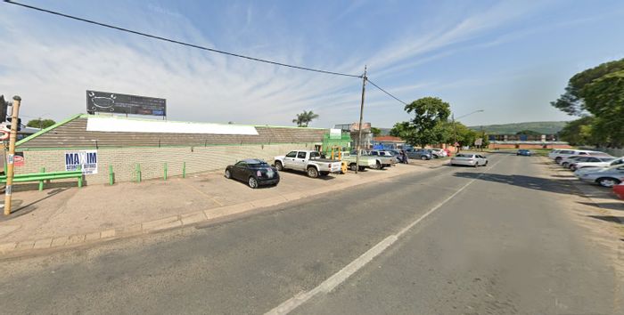 Retail property for sale in Gezina with workshop, paint booth, and car lifts.