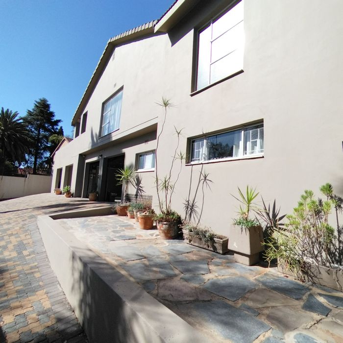 For Sale: Spacious Waterkloof Ridge house with pool, bar, and bachelor flatlet.