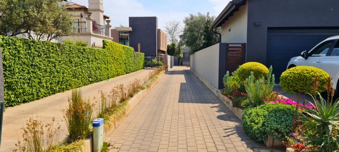 For Sale: House in Glen Eagle Estate with pool, garden, and versatile living spaces.