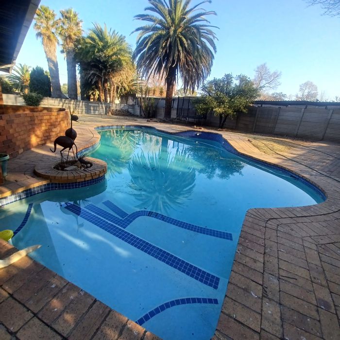 For Sale: Spacious 4-bedroom house with pool, study, and ample parking in Sasolburg Ext 23.