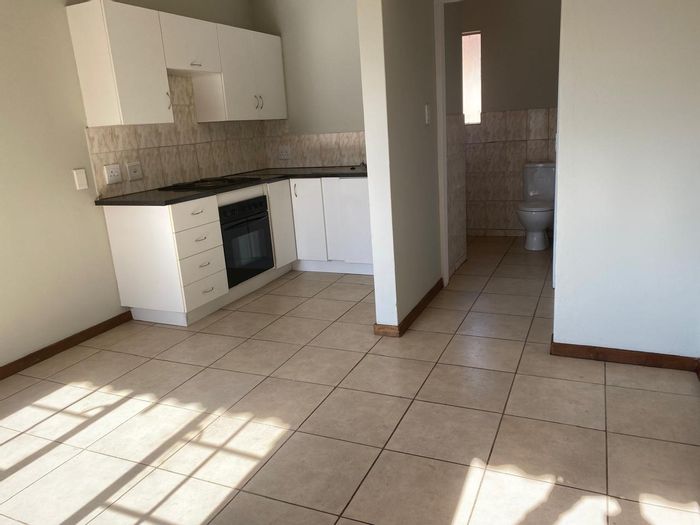 For Sale: Apartment in Kempton Park Central with security, parking, and rental potential.