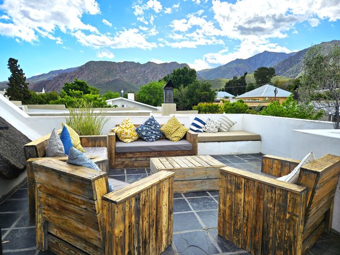 For Sale: Versatile 5-bedroom house in Montagu Central with garden and loft views.