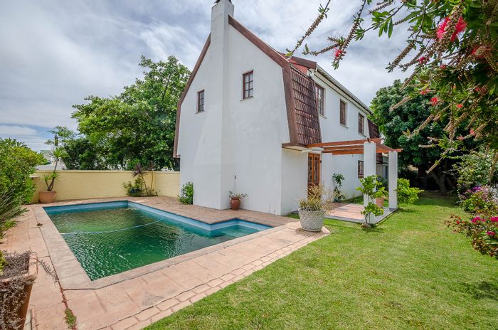 Dobson House For Sale: 4 bedrooms, pool, garage, flexible living spaces.