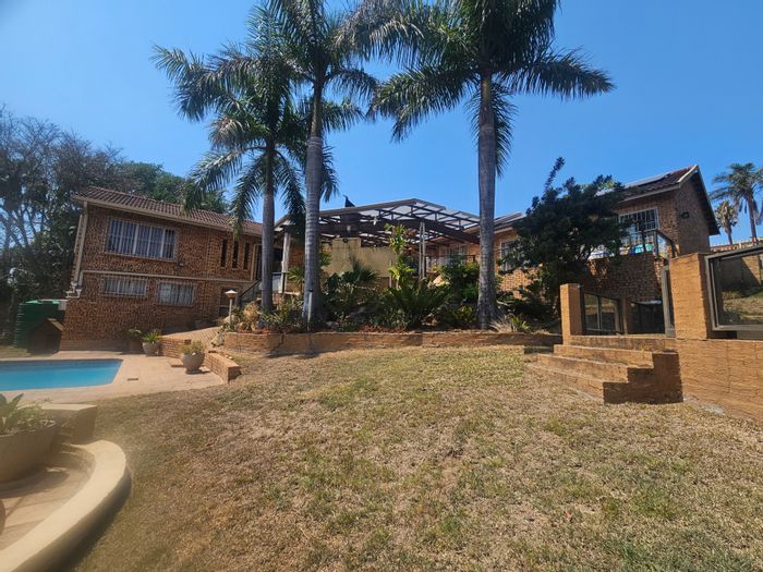 Spacious family house in Nelspruit Ext 11 with pool, bar, and solar panels. For Sale.