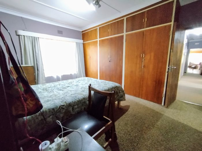 House for Sale in Potchefstroom Central: 4 bedrooms, garden, pool, and flatlet.