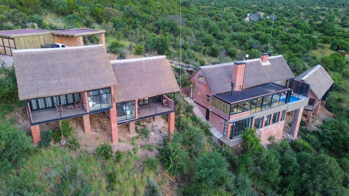 For Sale: House in Mabalingwe Nature Reserve with 5 en-suite bedrooms, pool, and solar.