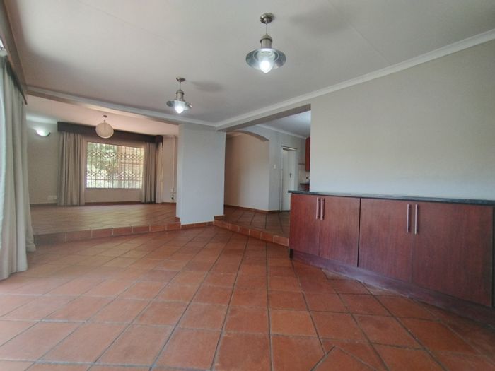 For Sale: 3-Bedroom Townhouse in Waterkloof Glen with private braai and spacious yard.