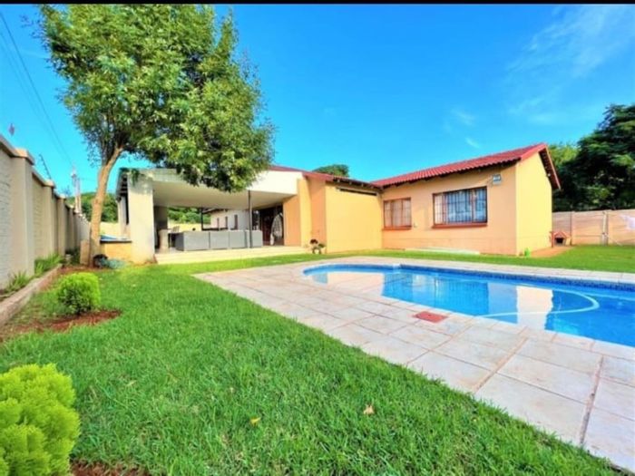 For Sale: Clubview House with pool, lapa, double garage, and spacious backyard.