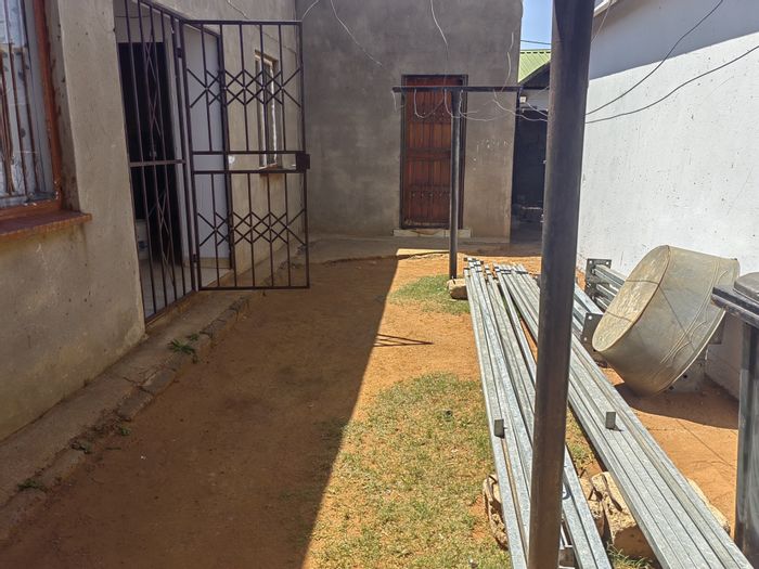 3-Bedroom House with Income-Generating Outbuildings in Protea Glen, For Sale.