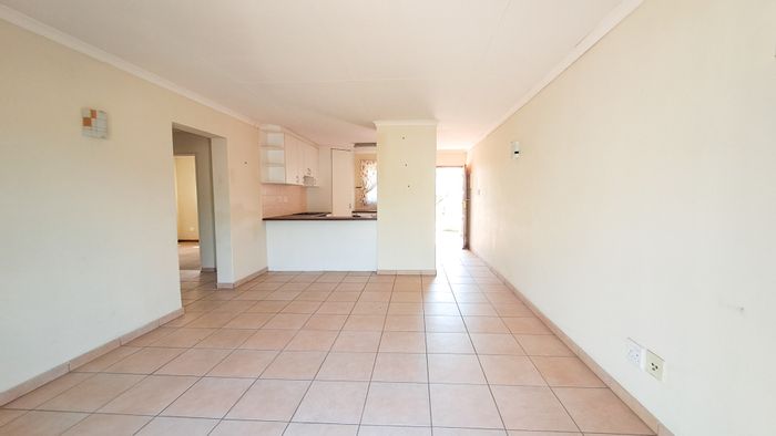 For Sale: Apartment in Olympus AH with open-plan living, study nook, secure estate.