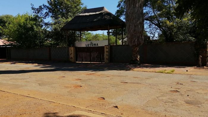 Spacious 10-bedroom house with ample parking in Kuruman Central, For Sale.