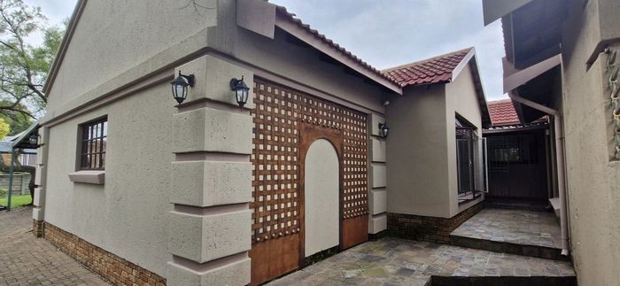 Secunda Central House For Sale: Two homes, entertainment area, security features, flatlet included.