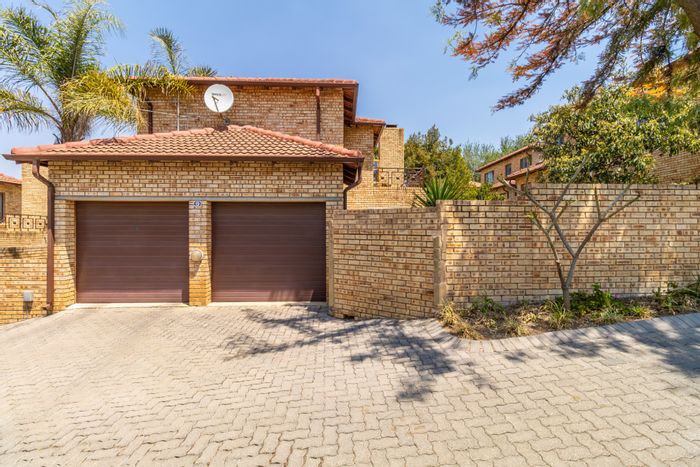 For Sale: Townhouse in Randpark Ridge with garden, security, and double garage.