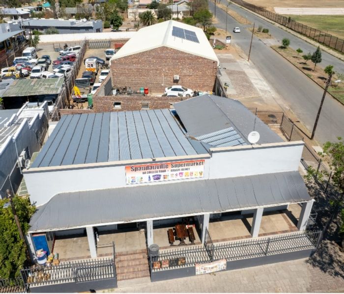 For Sale: Retail property in Graaff-Reinet Central with workshop and rental income potential.