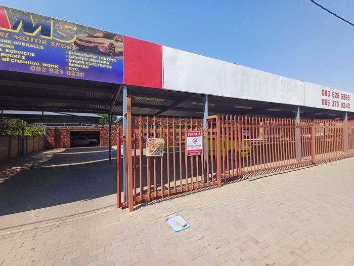 Retail property for sale in Freemanville with office space, workshops, and carports.