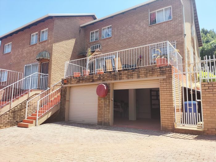 For Sale: Spacious 4-Bedroom Townhouse in Faerie Glen with outdoor play area.