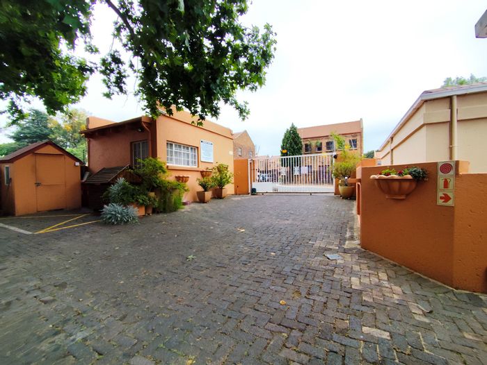 Pet-Friendly Townhouse in Weltevreden Park for Sale with Pool and Spacious Patio.