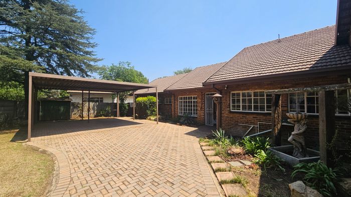 For Sale: Spacious 4-Bedroom House in Parkrand with Pool and Double Garage.